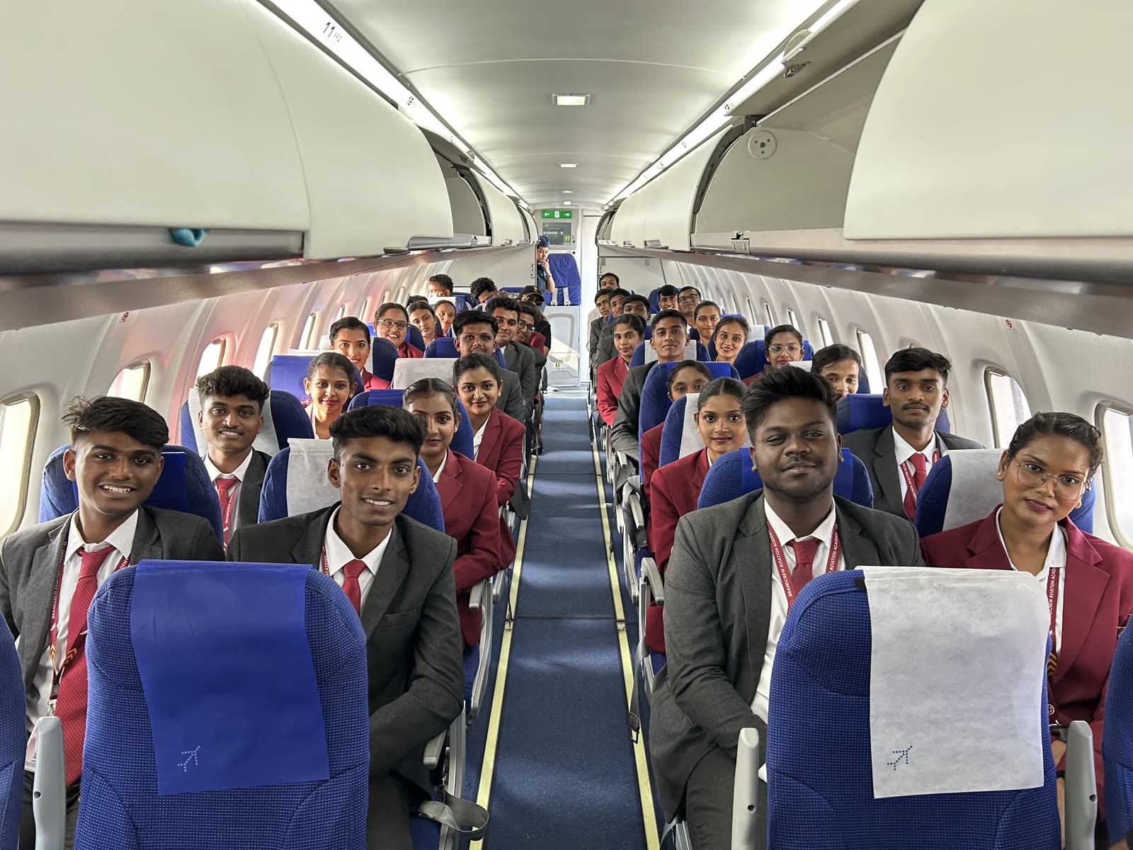 Brandcrew students inside the training aircraft cabin